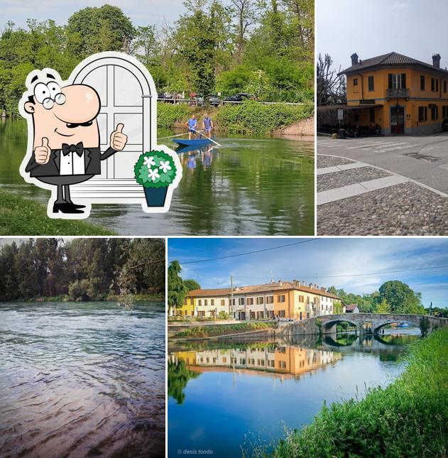 Puoi goderti l'aria fresca da seduto all'esterno di Osteria del Ponte