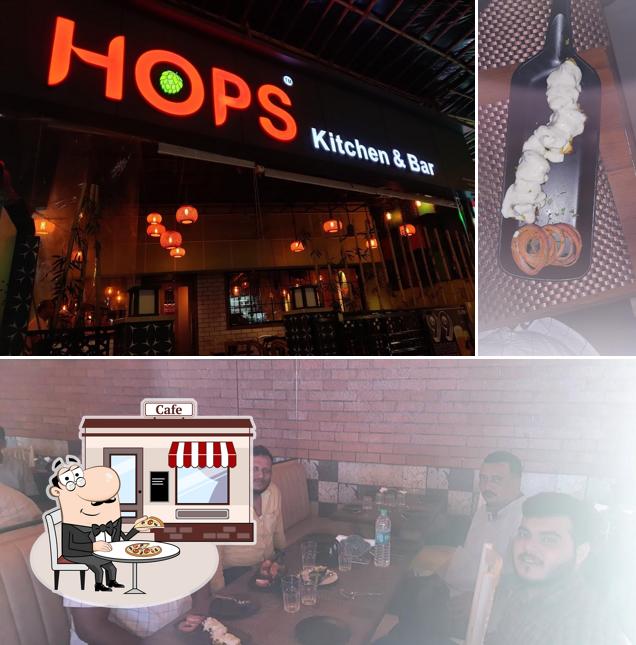 Among different things one can find exterior and bar counter at Hops Kitchen And Bar