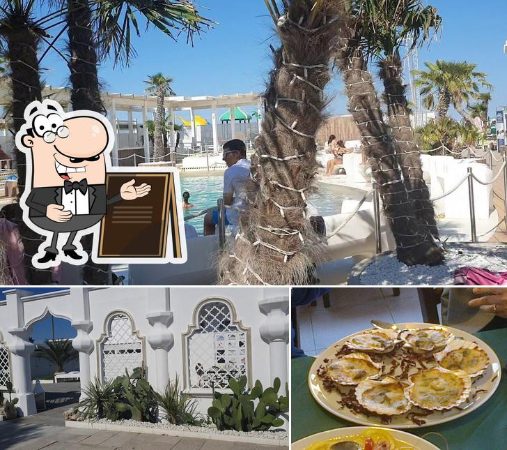 La immagine della esterno e tavolo da pranzo di Trattoria Pizzeria Bar 70 Comacchio
