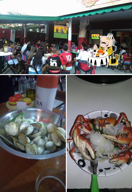 Dê uma olhada a foto ilustrando comida e interior a Boteco da Lambreta