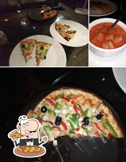 Pick pizza at Enjoy Restaurant