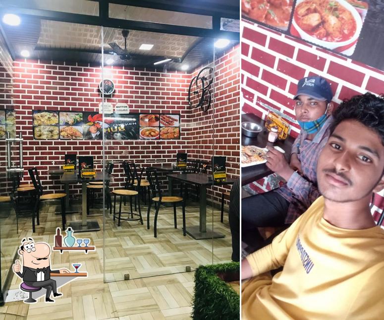Take a seat at one of the tables at CHICKEN HUB