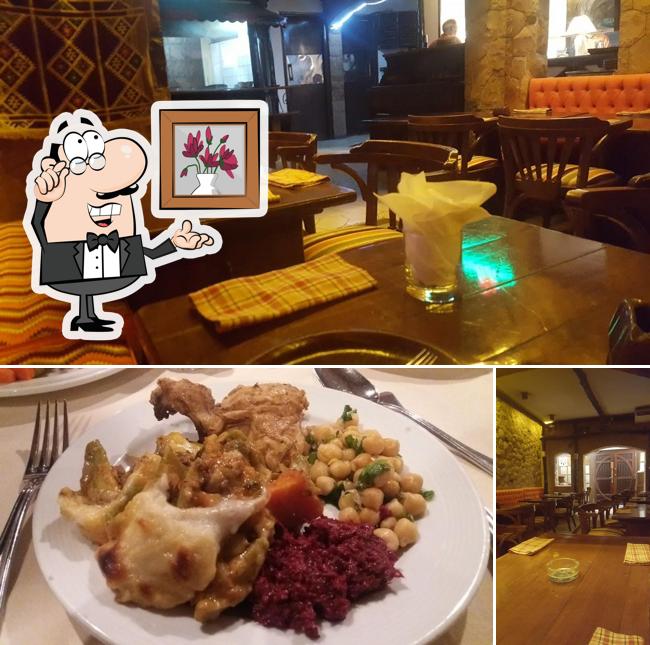 Take a look at the photo depicting interior and food at Bukhara indian restaurant