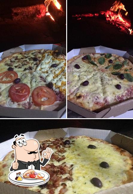 Escolha pizza no Pizzaria e Hamburgueria Tradição