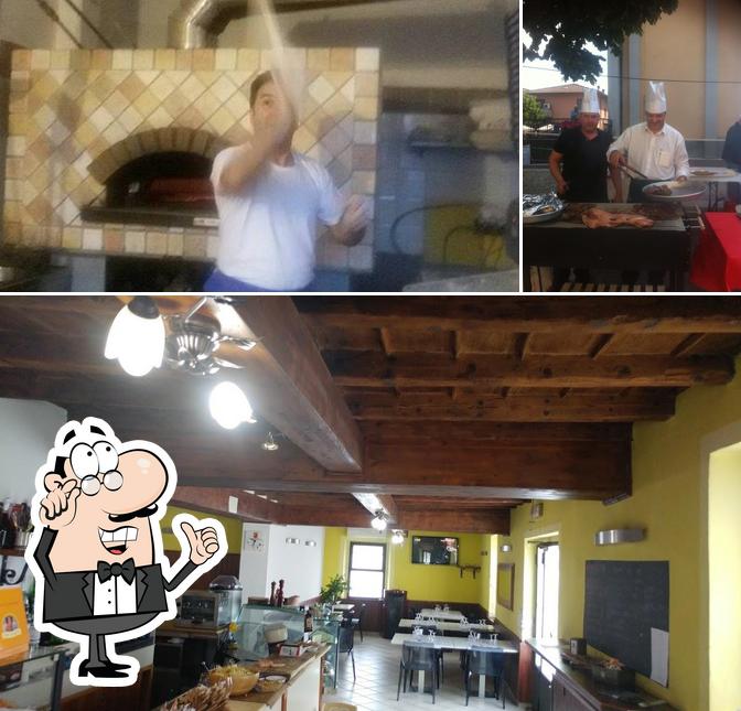 Tra le varie cose da Trattoria Bar Al Tormo si possono trovare la interni e tavolo da pranzo