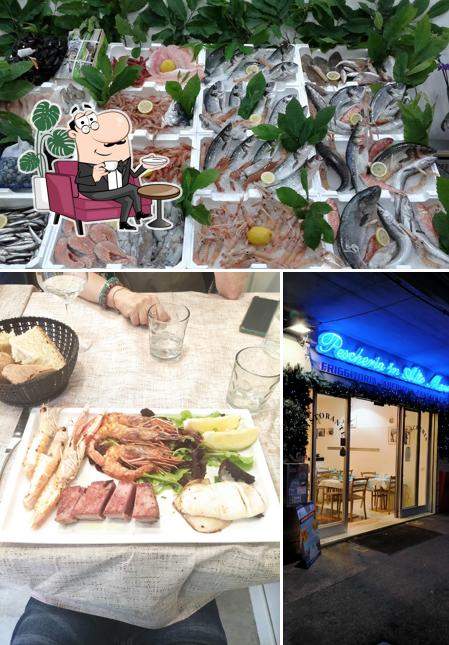 Tra le diverse cose da Pescheria ristorante in alto mare si possono trovare la interni e cibo