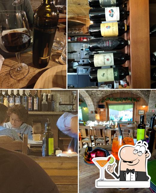 Guarda la immagine che mostra la bevanda e bancone da bar di Taverna Coppapan & Pizzeria Le Dahu