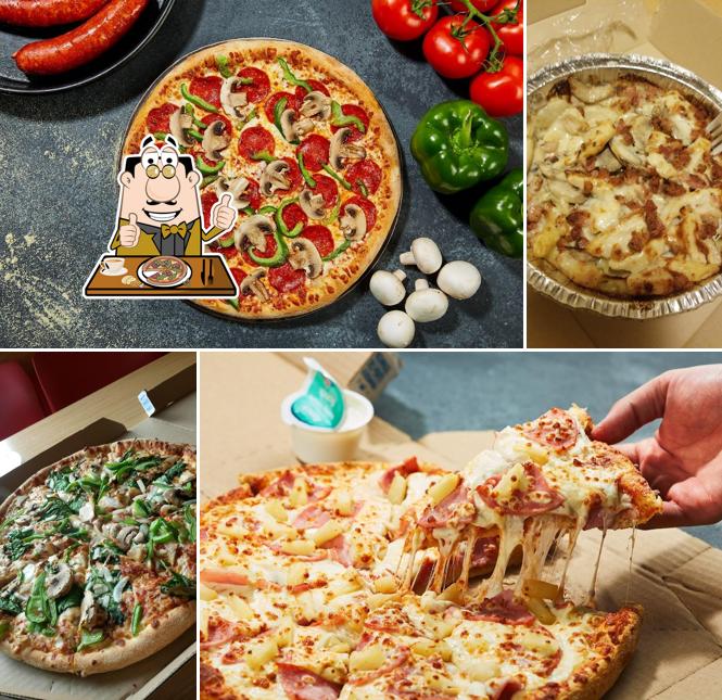 Try out pizza at Domino's Pizza