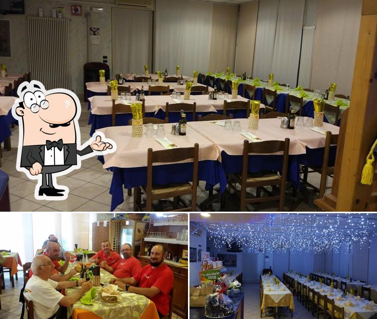 Dai un'occhiata agli interni di Trattoria Bar al Passetto La Rosa Blu