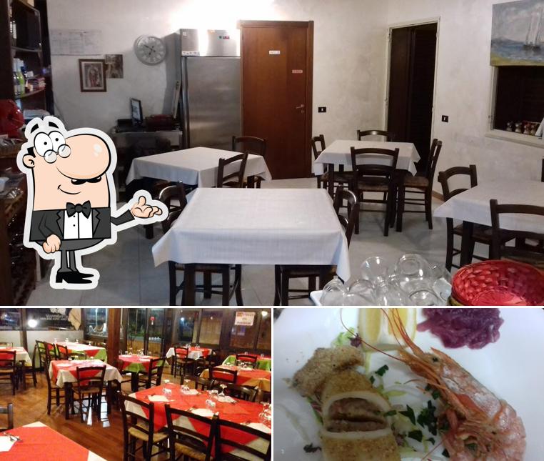 Trattoria Pizzeria Al Peschereccio se distingue par sa intérieur et nourriture