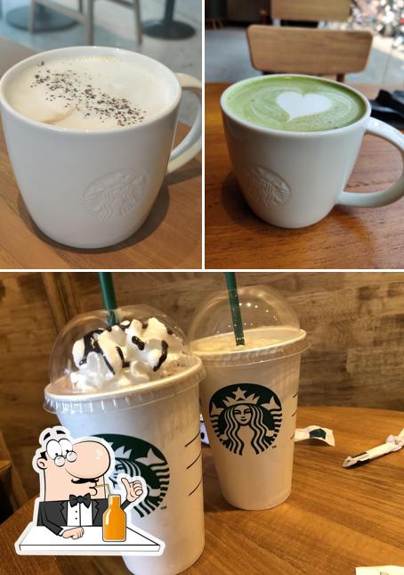 Enjoy a drink at STARBUCKS COFFEE