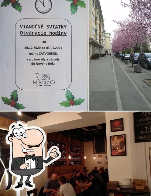 L’image de la extérieur et comptoir de bar de Manzo Steak & Burger’s