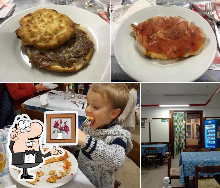 Pizzeria Giuli si caratterizza per la interni e cibo