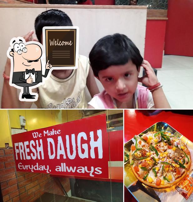 Look at the photo of EVERYDAY PIZZA