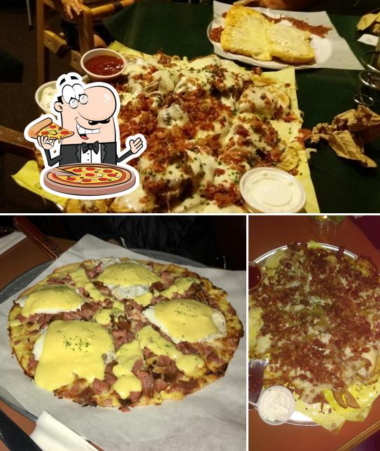 Get pizza at Spud's Pizza Parlor