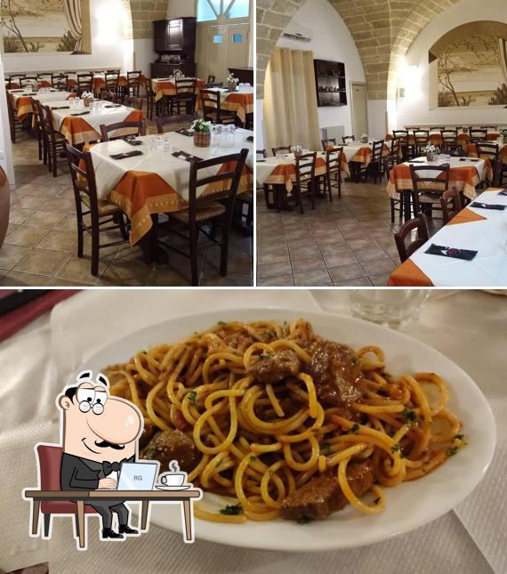 La immagine di interni e cibo da Antiche Tradizioni Ristorante Braceria