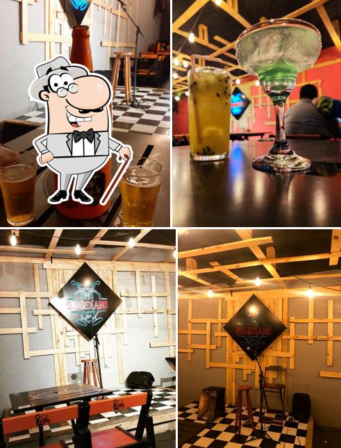 Entre diversos coisas, exterior e comida podem ser encontrados no Guardians Empório Pub