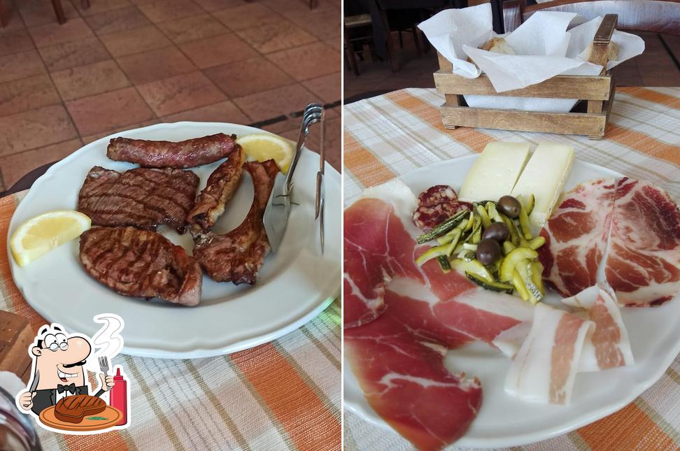 Prenditi i un pasto a base di carne a Trattoria I Frungigl'