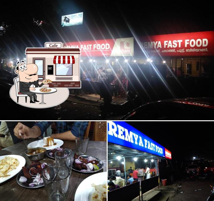 Among various things one can find exterior and dining table at Remya Restaurant