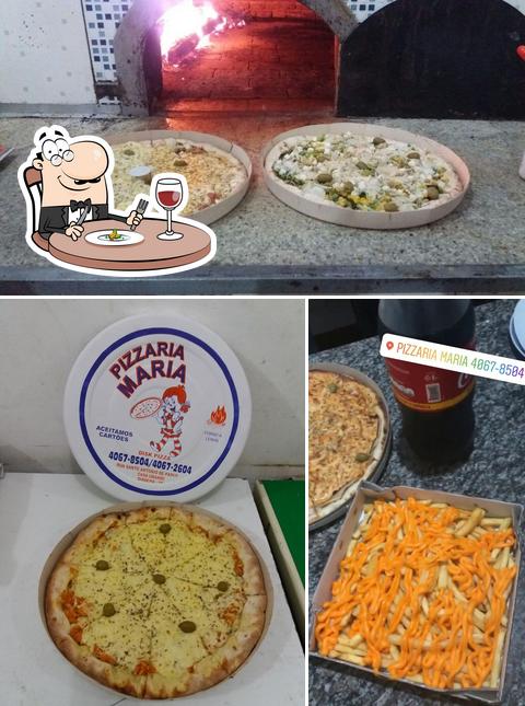 Comida em Pizzaria Maria