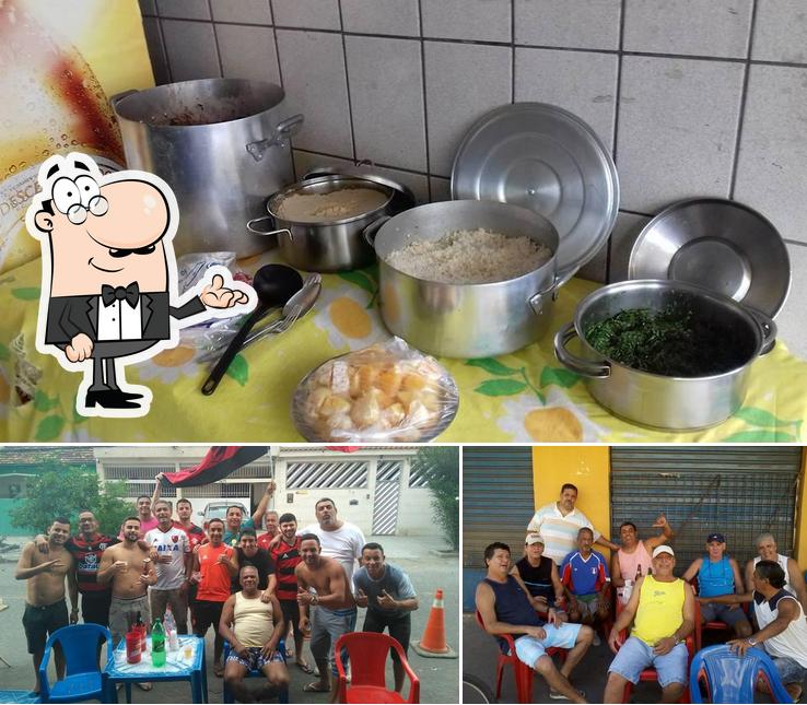 Entre diversos coisas, interior e comida podem ser encontrados no Bar Do Ney