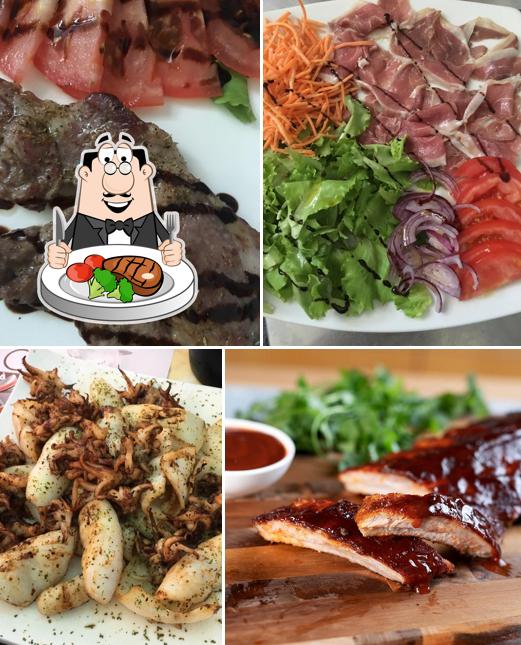Prenditi i un pasto a base di carne a Languorino