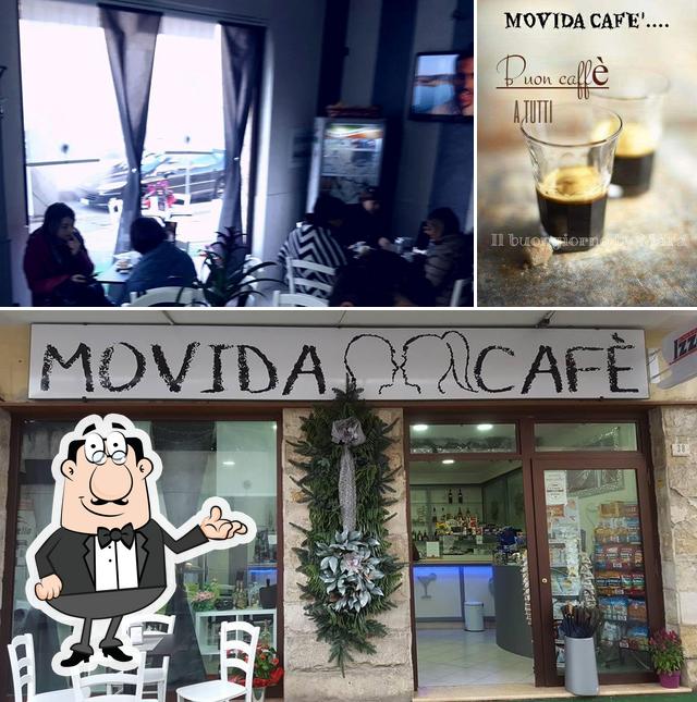 Посмотрите на это фото, где видны внутреннее оформление и напитки в Movida cafe'