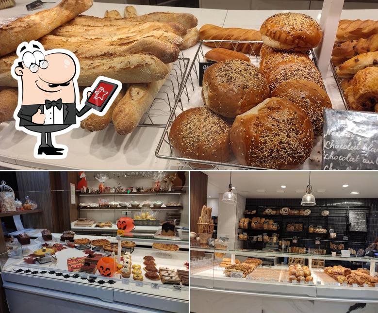 Parmi les diverses choses de la extérieur et la nourriture, une personne peut trouver sur Boulangerie pâtisserie l'atelier des pains