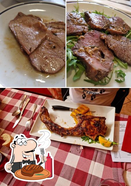 Prenditi i un pasto a base di carne a Trattoria Al Cacciatore