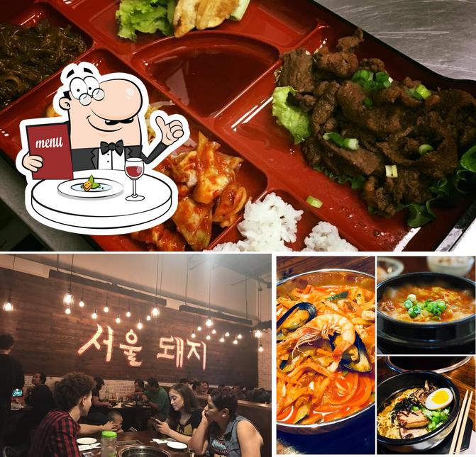 Take a look at the picture showing food and bar counter at Seoul Pig Korean BBQ