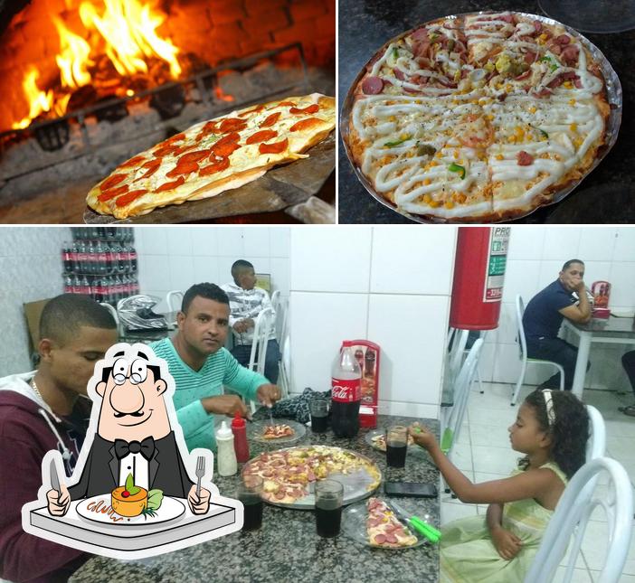 Entre diferentes coisas, comida e interior podem ser encontrados no Lanchonete e Pizzaria Dois Irmãos