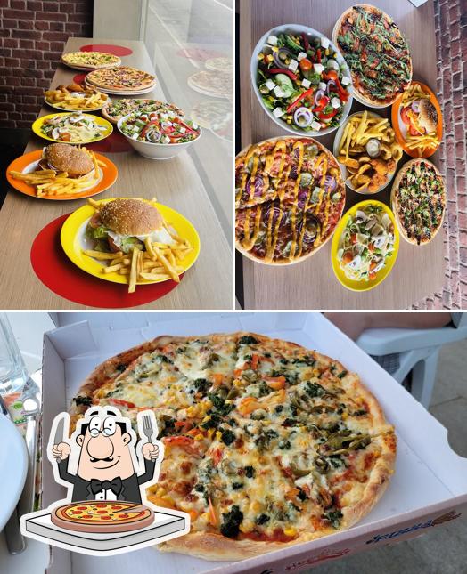 Попробуйте пиццу в "Domi'Uno Pizza"