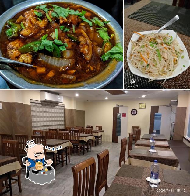 Among different things one can find food and interior at Hotel Bharath Muvattupuzha