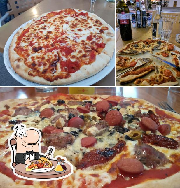 Pick pizza at Edesia Restaurant
