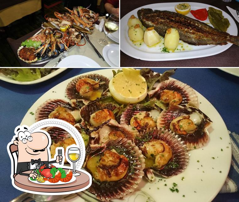 Отведайте блюда с морепродуктами в "Restaurante la Colegiata"