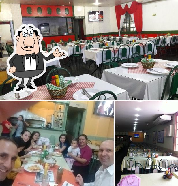 O interior do Pizzaria Nova Grécia