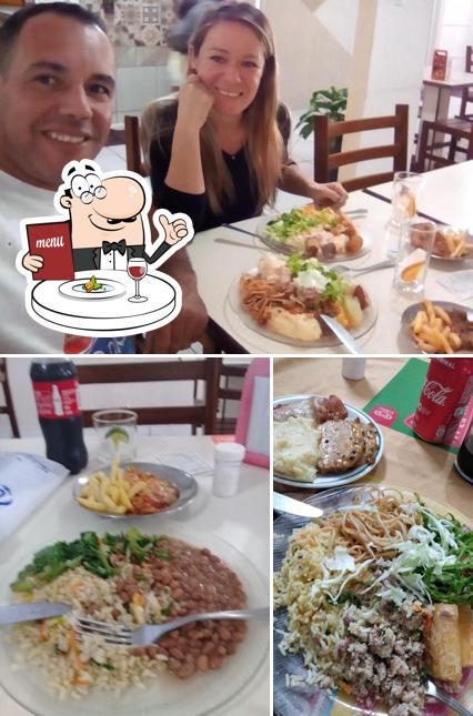 Mira las imágenes que muestran comida y comedor en Restaurante Chef Tavinho Docimar