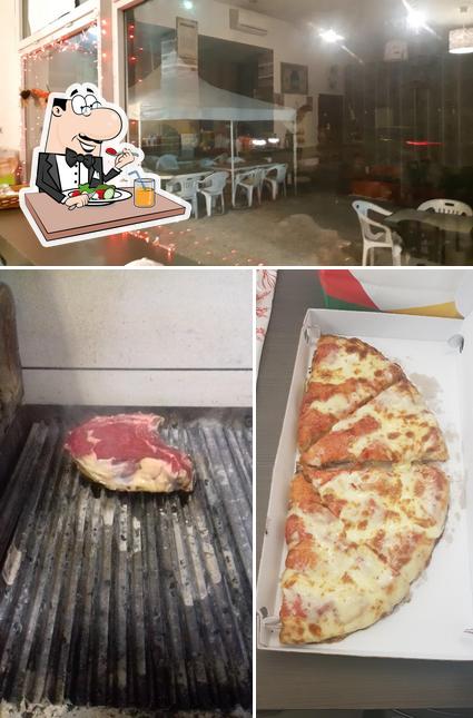 La foto della cibo e interni di Pizzeria ristorante KIKIRIKI