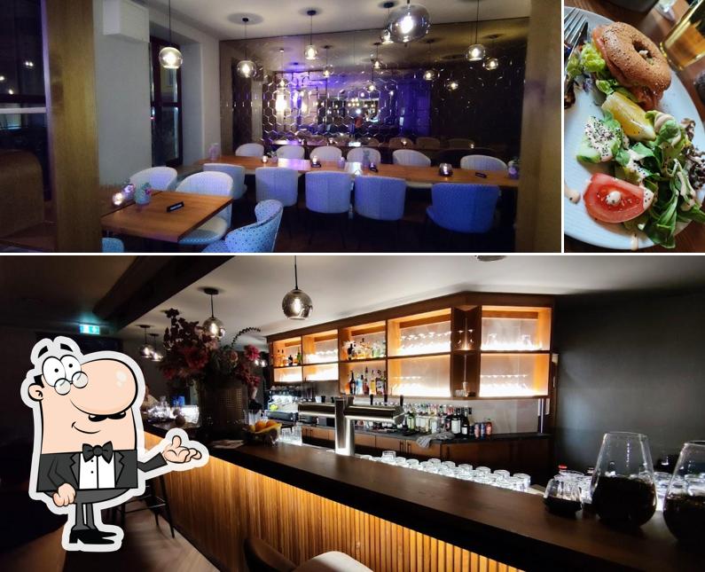 Check out the image depicting interior and food at Mina Mainburg