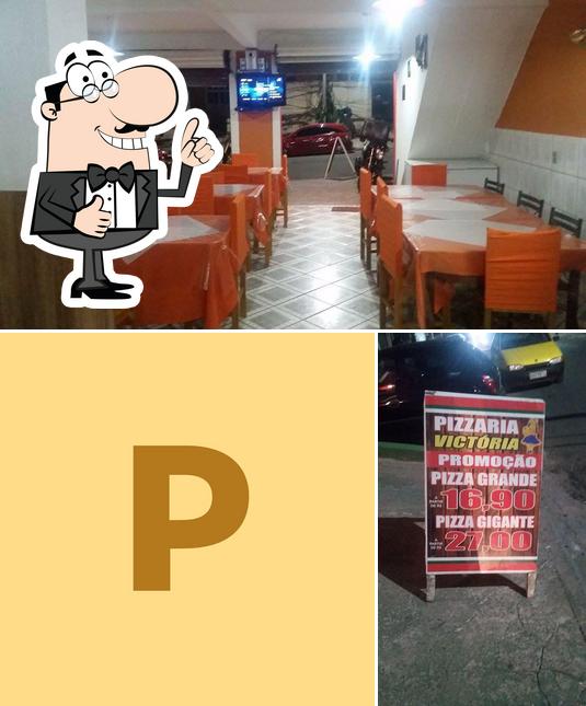 Look at this picture of Pizzaria Victória