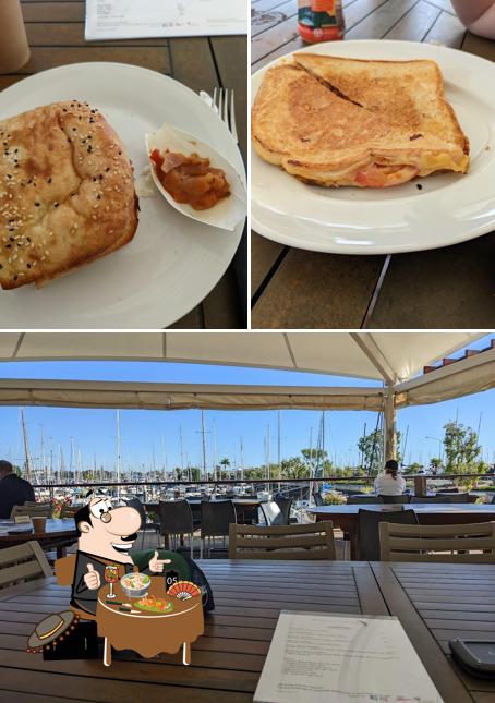 Take a look at the picture displaying food and dining table at The Captain’s Parrot Cafe