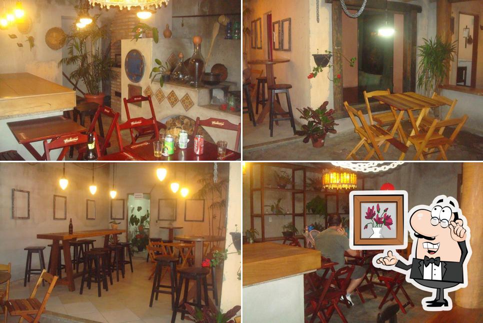 Sente em uma das mesas no Restaurante Dona Chica