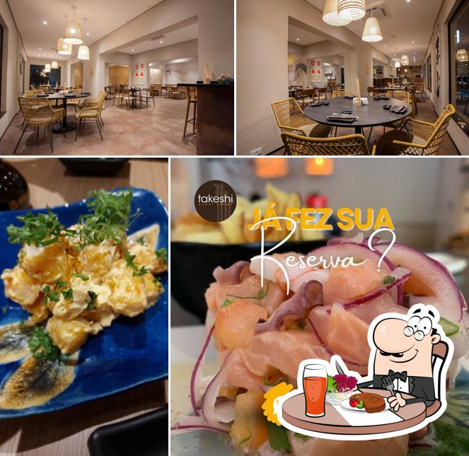 A foto do Takeshi Sushi House’s mesa de jantar e comida
