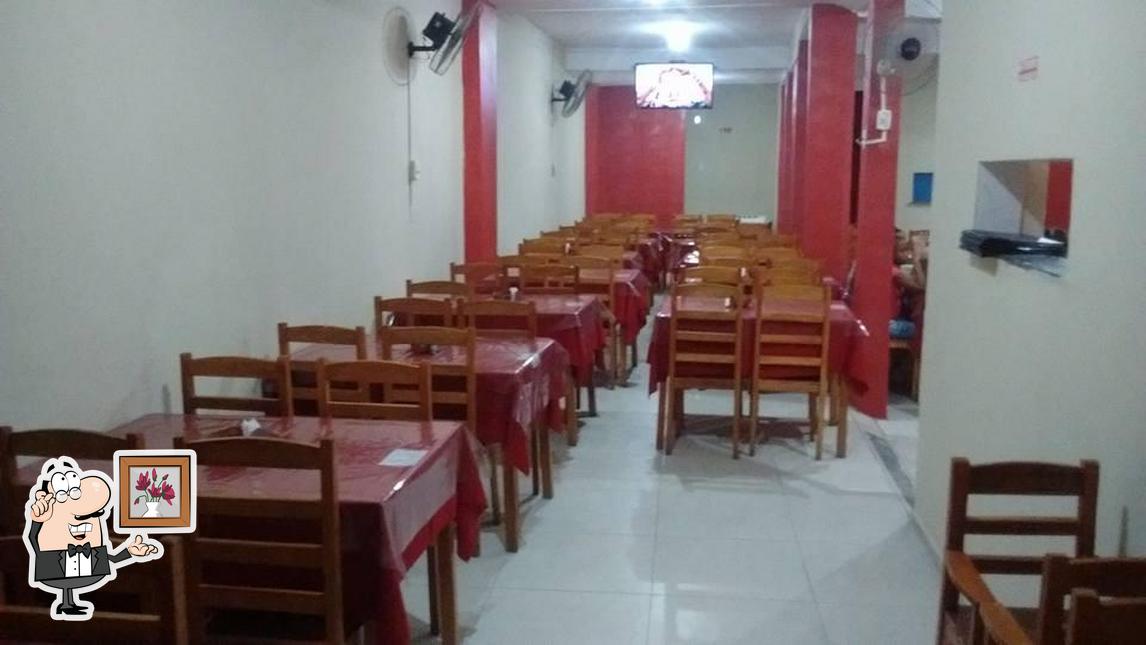 O interior do Pizzaria Paraiso