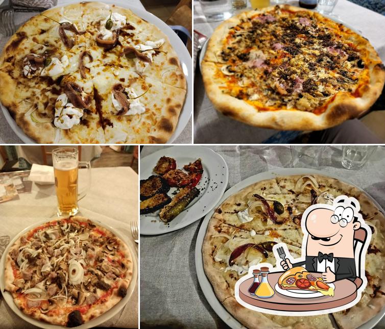 Scegli una pizza a La Taverna dell'Artista Ristorante-Risotteria-Pizzeria