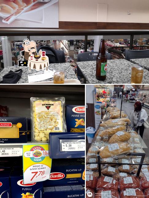 A imagem da comida e cerveja no Supermercado Cotripal