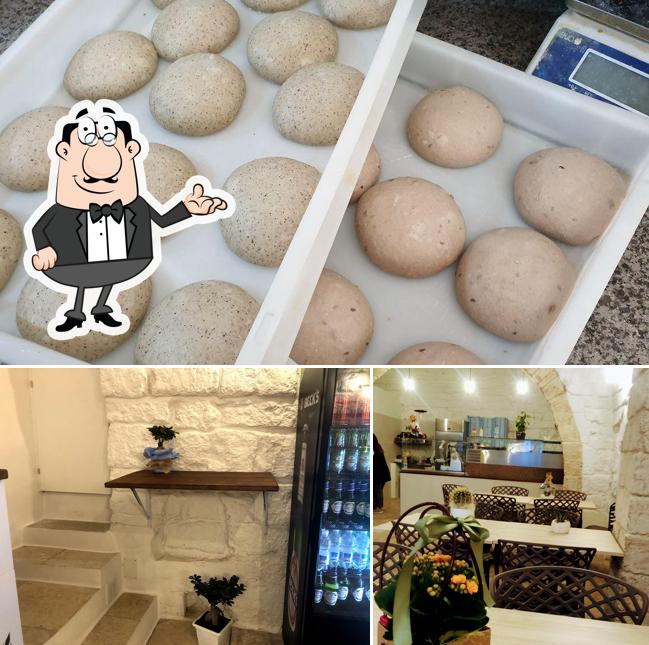 Questa è la immagine che presenta la interni e cibo di Pizzeria antimo