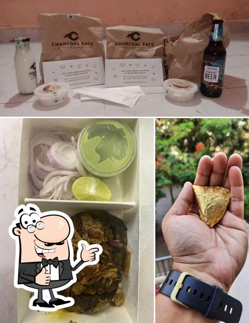 Look at the picture of Charcoal Eats