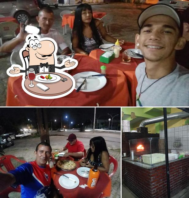 A Irami Pizzaria se destaca pelo mesa de jantar e interior