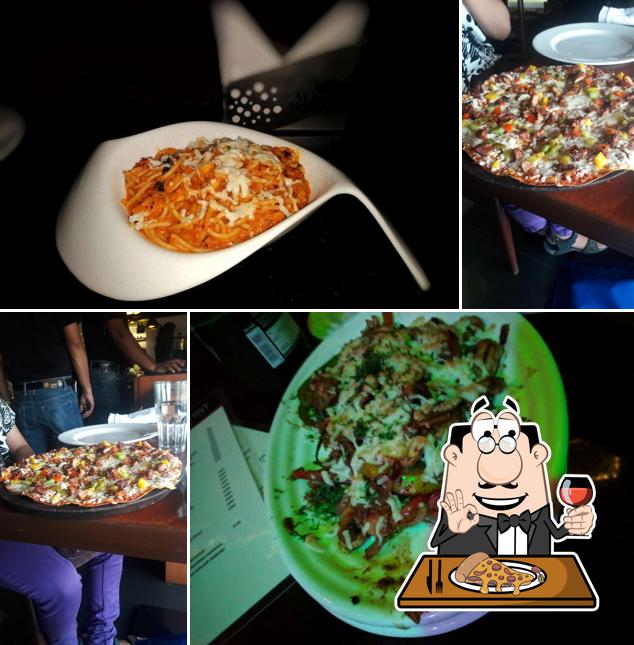 Get pizza at Privy Ultra Lounge